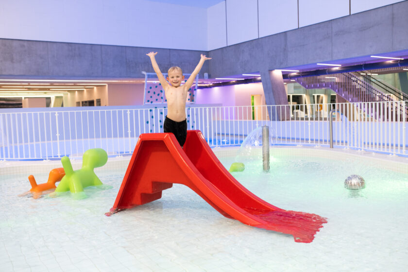 A kid on a slide